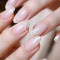 pink sparkling gel manicure service at nail salon